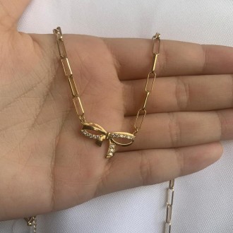 Detalhes do produto Colar Corrente Cartier com Pingente Laço Cravejado