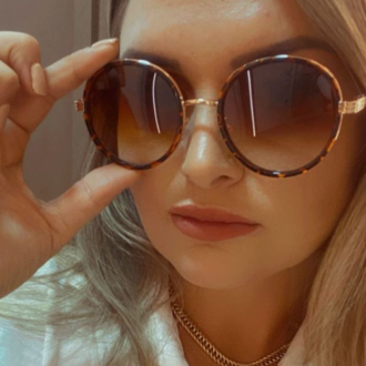 Detalhes do produto Oculos Redondo Animal Print