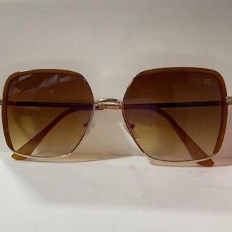 Detalhes do produto Oculos Marrom com detalhes Dourados