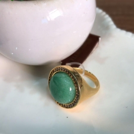 anel redondo bola verde com pontinho de luz