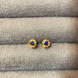 Brinco Flor com Ponto De Luz Azul