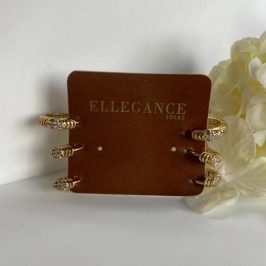 brinco brilhante em formato de cruz