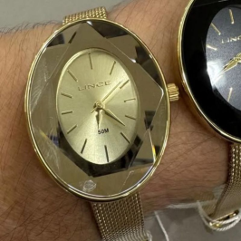 Relógio Analógico dourado oval