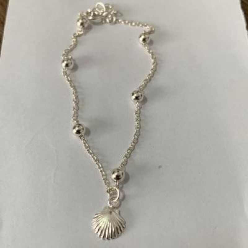 Pulseira com Bolinhas e Concha