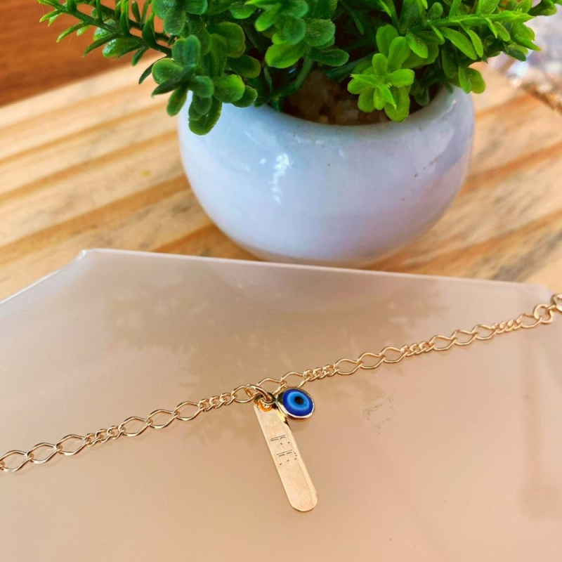 Pulseira placa fé e olho grego
