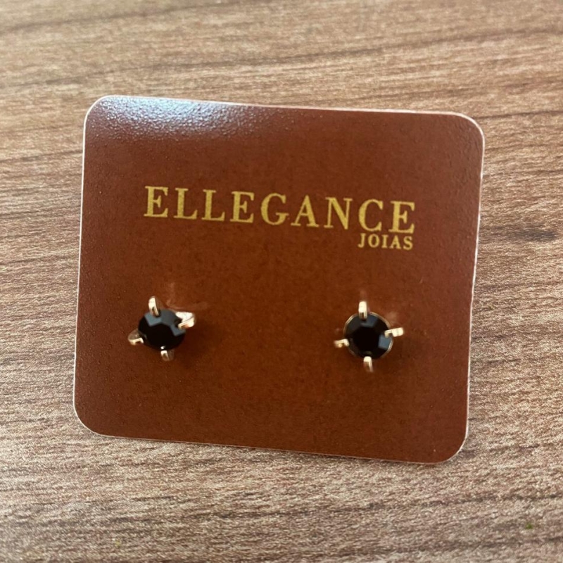 Brinco ponto de luz 4 garras preto