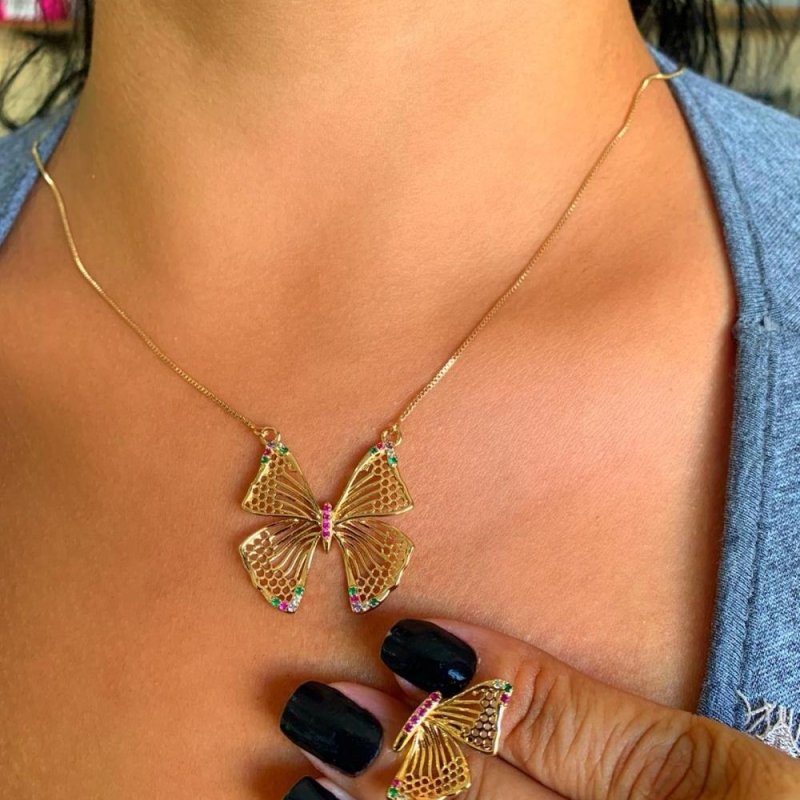 conjunto borboleta detalhe roxo