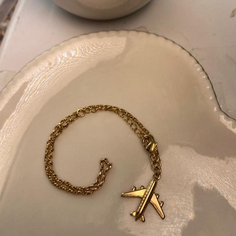 Pulseira pingente avião