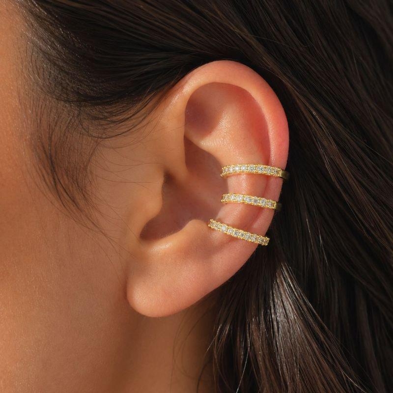 piercing fake  tres linhas cravejadas