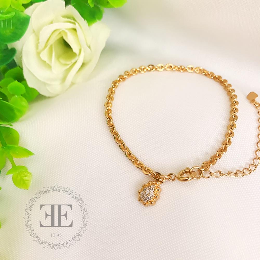 Pulseira com pingente cravejado