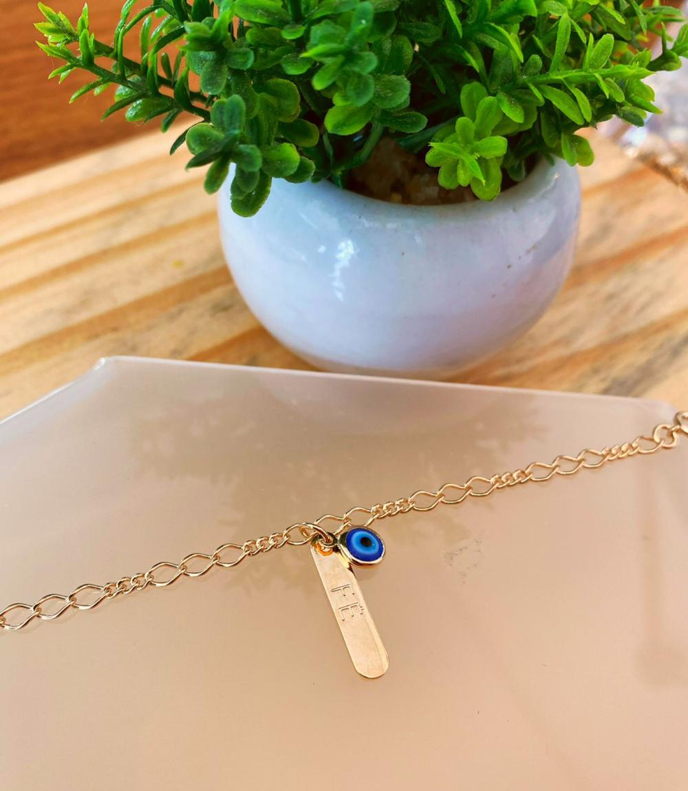 Pulseira placa fé e olho grego