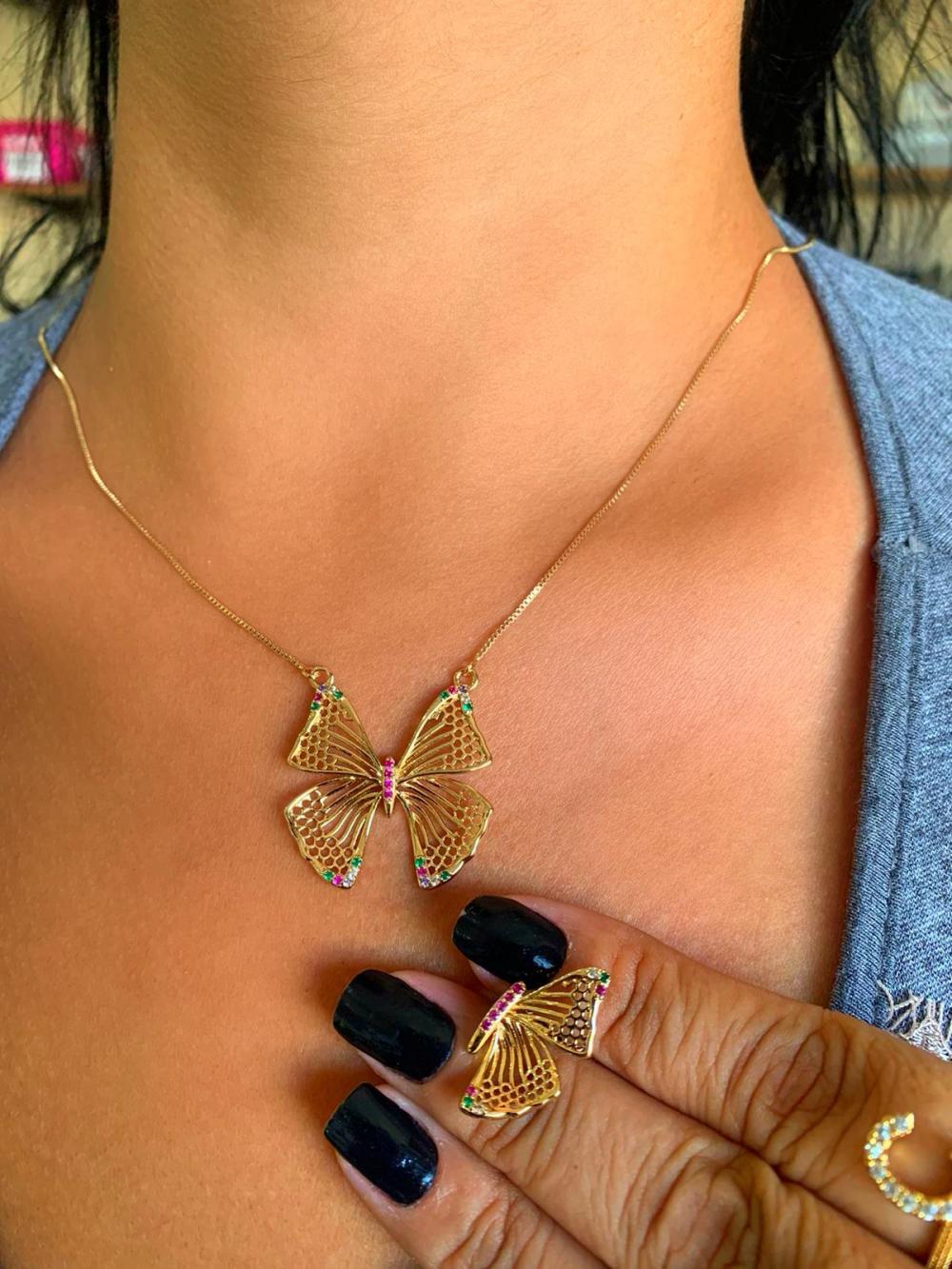 conjunto borboleta detalhe roxo