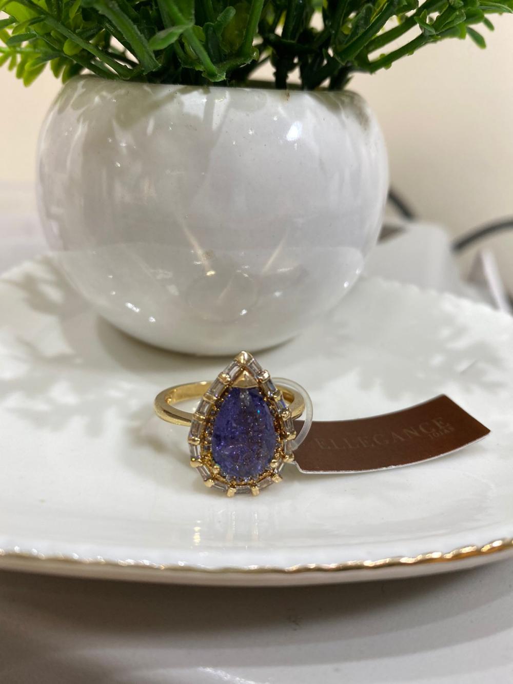 Anel cristal lilas oval com detalhes
