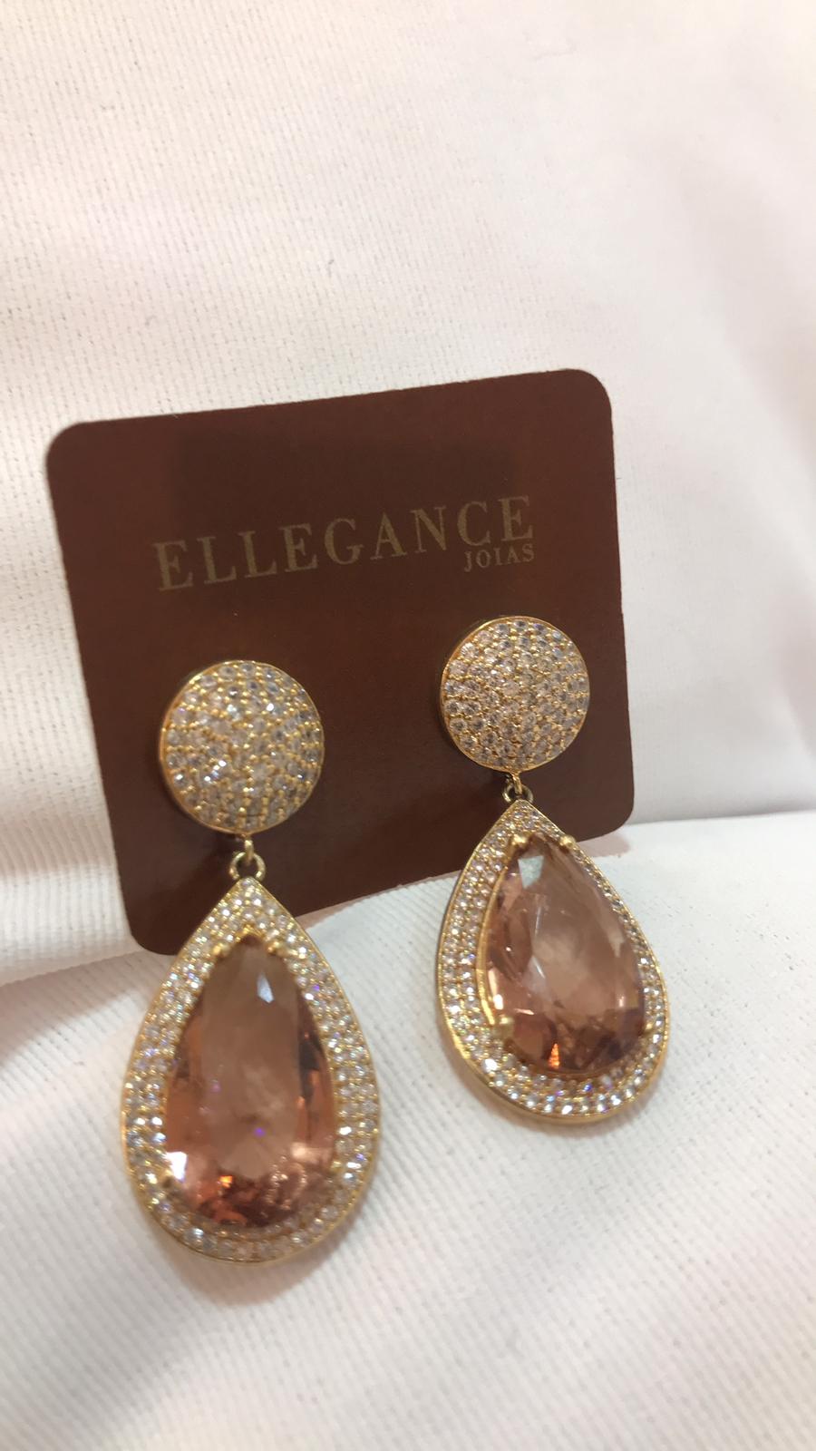 brinco com bola cravejada e cristal laranja metálico