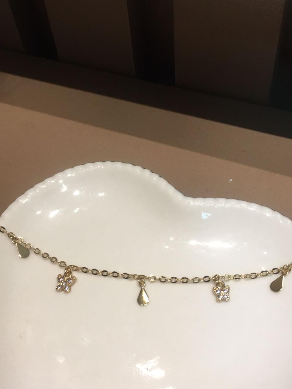 colar pequenas borboletas com cristal e gotas