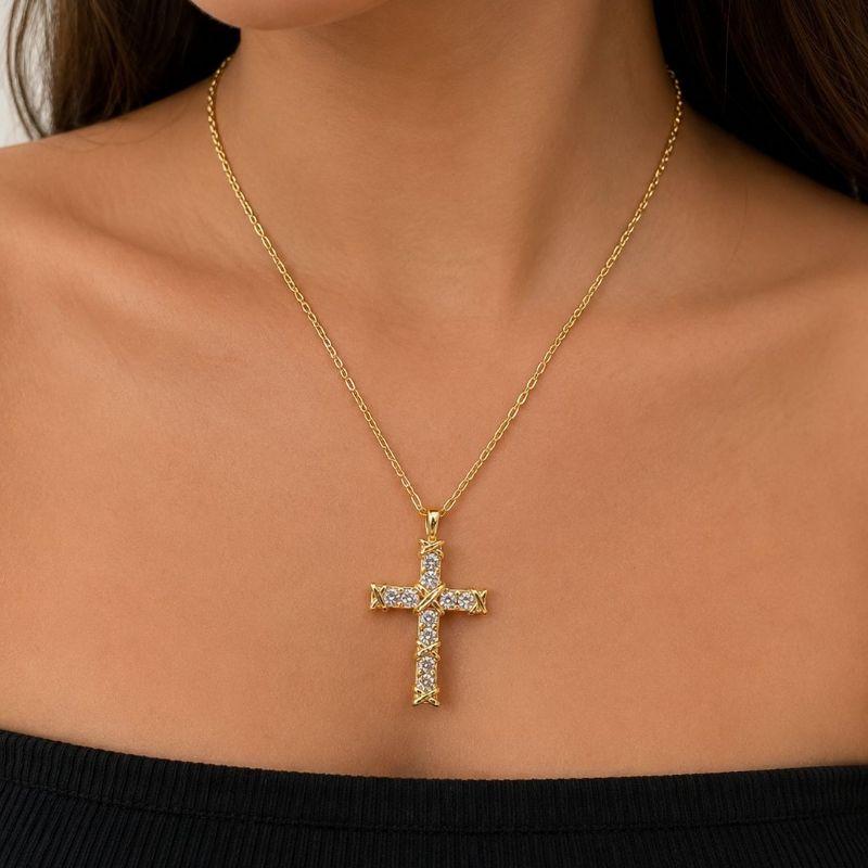 Colar elo cartier com pingente de cruz cravejada